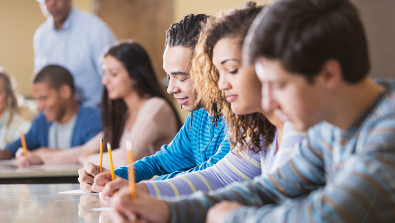 students taking notes during drivers ed classes